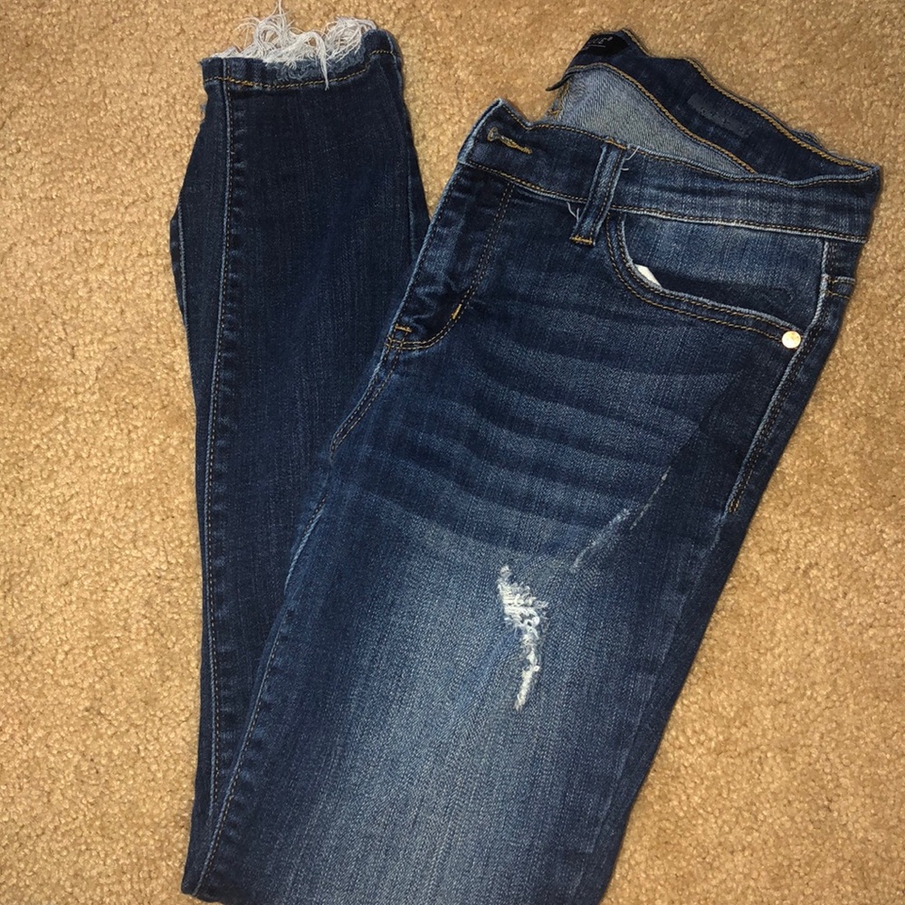 Ripped blue skinny jeans
